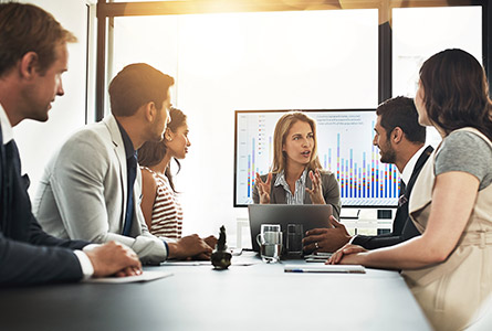 men and women in a business meeting