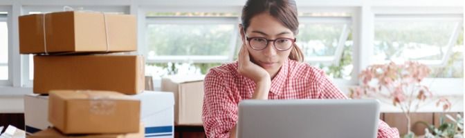 Businesswoman working on online orders