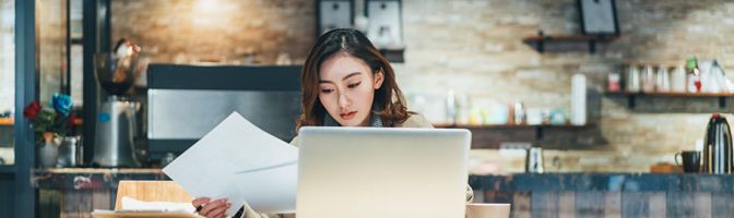 woman-looking-at-papers