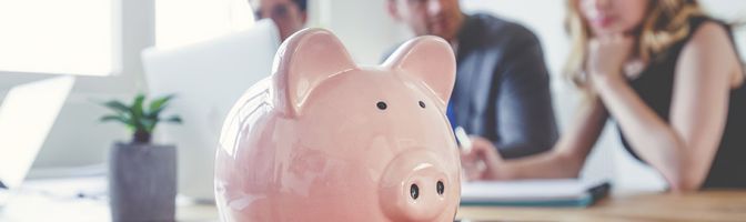 close up of a piggy bank on a table