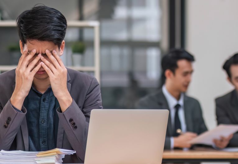 man focusing on computer