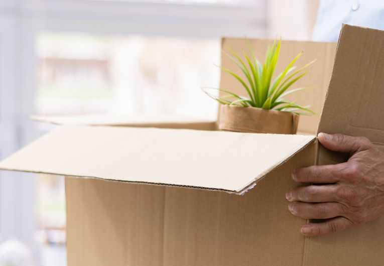 Employee packing up desk