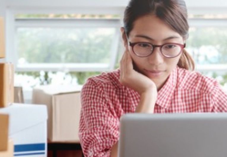 Businesswoman working on online orders