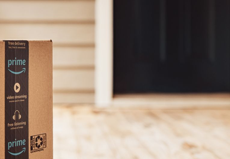 Amazon prime box on front steps