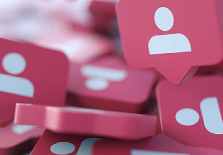 close up of a pile of foam speech bubbles with social media icons on them