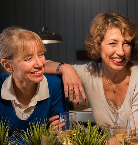 group of women talking in a restaurant